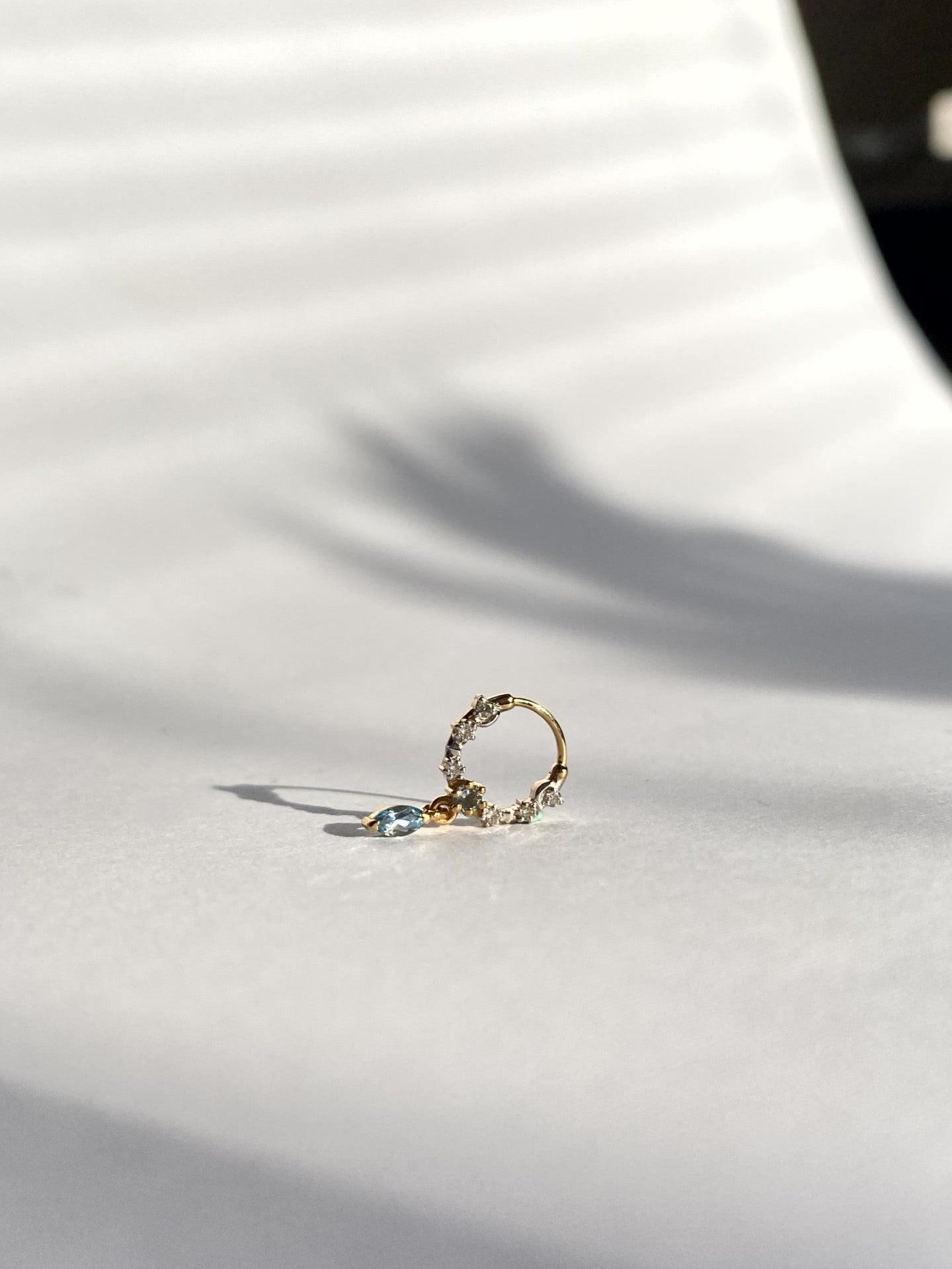 Cosmic Topaz Septum Ring